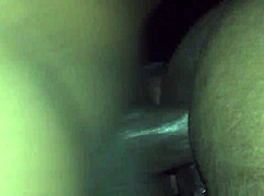 Close-up view of ebony woman in bent-over position