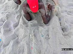 girlfriend masturbates on the beach, cumming with natural tits exposed