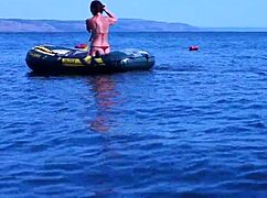 Enjoying A Boat Ride On The Volga River In Bikini.