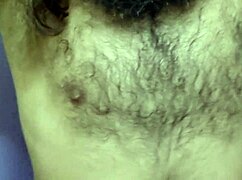 Hairy muscular guy shows off outdoors in uncut video