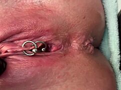 Pierced Clit Rubbed Hard In Latex And Pee Stream!