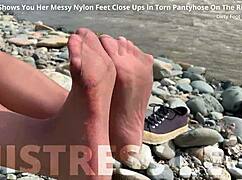 Imagine the goddess revealing her messy nylon feet in torn pantyhose by the river bank, toes wiggling close up