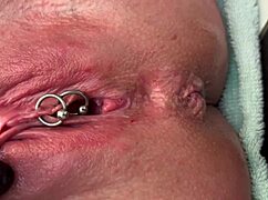 Pierced Clit Rubbed Hard In Latex And Pee Stream!