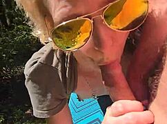 Wife delivers quick handjob on outdoor walk