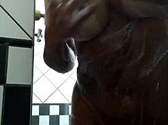 Hot latina brunette shows big tits and ass in shower!