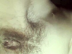 Teacher strokes her hairy wet pussy during a quick break