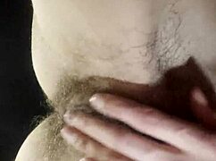 Teacher strokes her hairy wet pussy during a quick break