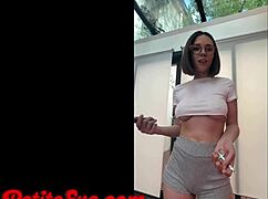 Cute petite latina plays with big dick dildo.