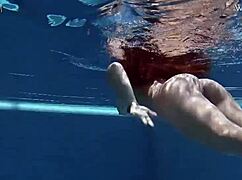 Does Diana Rius touch her hot tits underwater?