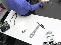 Busty milf shoplifter confronted by officer over the table