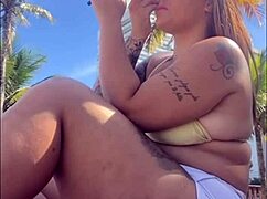 African woman flashes big pussy on beach exhibition