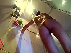 hidden camera captures young girl undressing in shower room