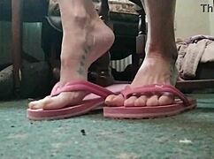 huge talons on exotic feet in flip flops