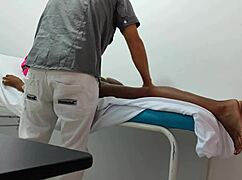 the doctor gives special attention and sensual massage to his female patient