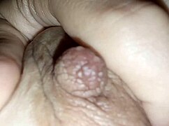 Latte flows from brunette's nipples