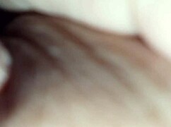 Latte flows from brunette's nipples