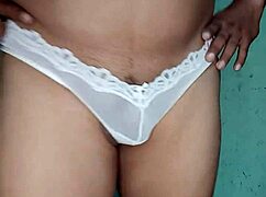 getting excited in a white thong, dancing around in lingerie.