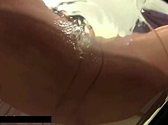 She gets her nylons wet and rips the crotch for some solo fun.