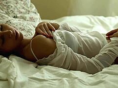 skinny roxana explores her body with fingers in the bedroom