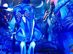 sexy spiderbabe in halloween costume teasing with contrasts