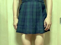 japanese teen in school swimsuit costume gets anal plug inserted with pierced nipples