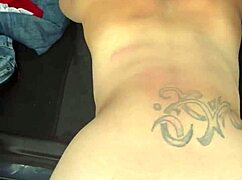 Busty hooker rides cock reverse cowgirl in car, takes load on phat ass