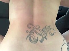 Busty hooker rides cock reverse cowgirl in car, takes load on phat ass