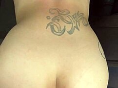 Busty hooker rides cock reverse cowgirl in car, takes load on phat ass