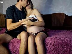 This 9th month pregnant blonde teen sucks and rides her boyfriend hard on the couch.