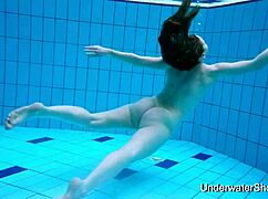 Watch This Sexy Girl Reveal Her Stunning Young Body Underwater!