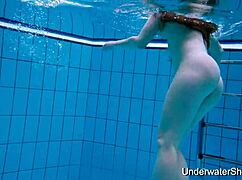 Watch This Sexy Girl Reveal Her Stunning Young Body Underwater!