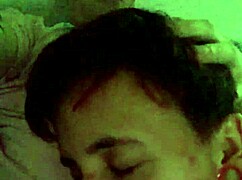 Woman performs oral on large penis.