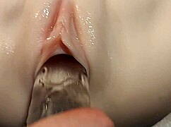 Fake Cock Penetrates Her Hairless Pussy in a Double Penetration Fetish Scene