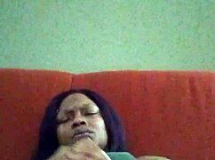 Ebony beauty with hairy pussy making herself creamy through intense self-pleasure