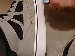 Friend has fun trashing my sneakers.