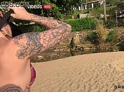 pervertida shows tits on beach