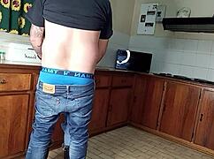 cute homemade quickie in kitchen, fucking standing with hairless pussy.