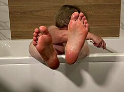want to wash my big tits feet in the bath?