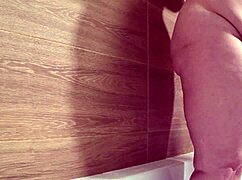BATHROOM CAMERA WATCHES AS MATURE WIFE WITH PLUMP FIGURE TAKES A SHOWER PAWG