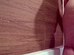 BATHROOM CAMERA WATCHES AS MATURE WIFE WITH PLUMP FIGURE TAKES A SHOWER PAWG