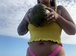 Can you see her swollen pussy lips flashing in that tiny bikini?