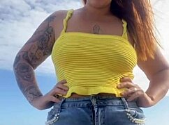 Can you see her swollen pussy lips flashing in that tiny bikini?