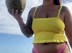 Can you see her swollen pussy lips flashing in that tiny bikini?