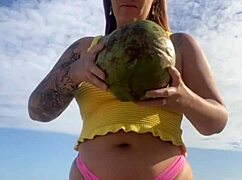 Can you see her swollen pussy lips flashing in that tiny bikini?