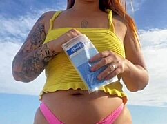 Can you see her swollen pussy lips flashing in that tiny bikini?