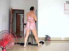 chick tries on linen and dresses at the resort