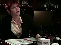 Rude redhead boss rams her submissive lesbian employee with a strapon