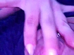 She touches herself while watching porn in her room.