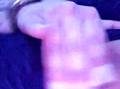 She touches herself while watching porn in her room.