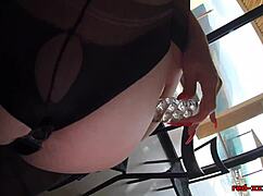 Sexy redhead milf subtly pleasures her shaved pussy with a dildo